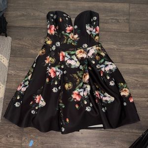 This a cute black puffy dress, it has only been worn twice.